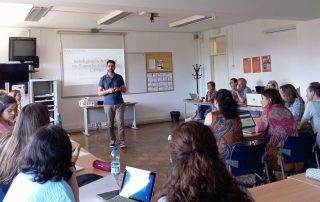 Sala repleta na Reunião Geral de Educadores Clínicos